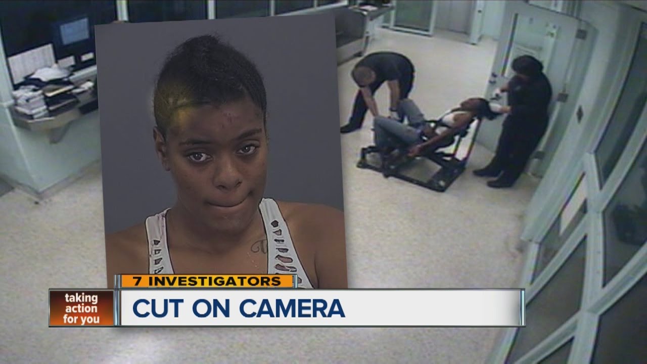 Warren police officer cuts off Detroit mother's sewn-on hair weave