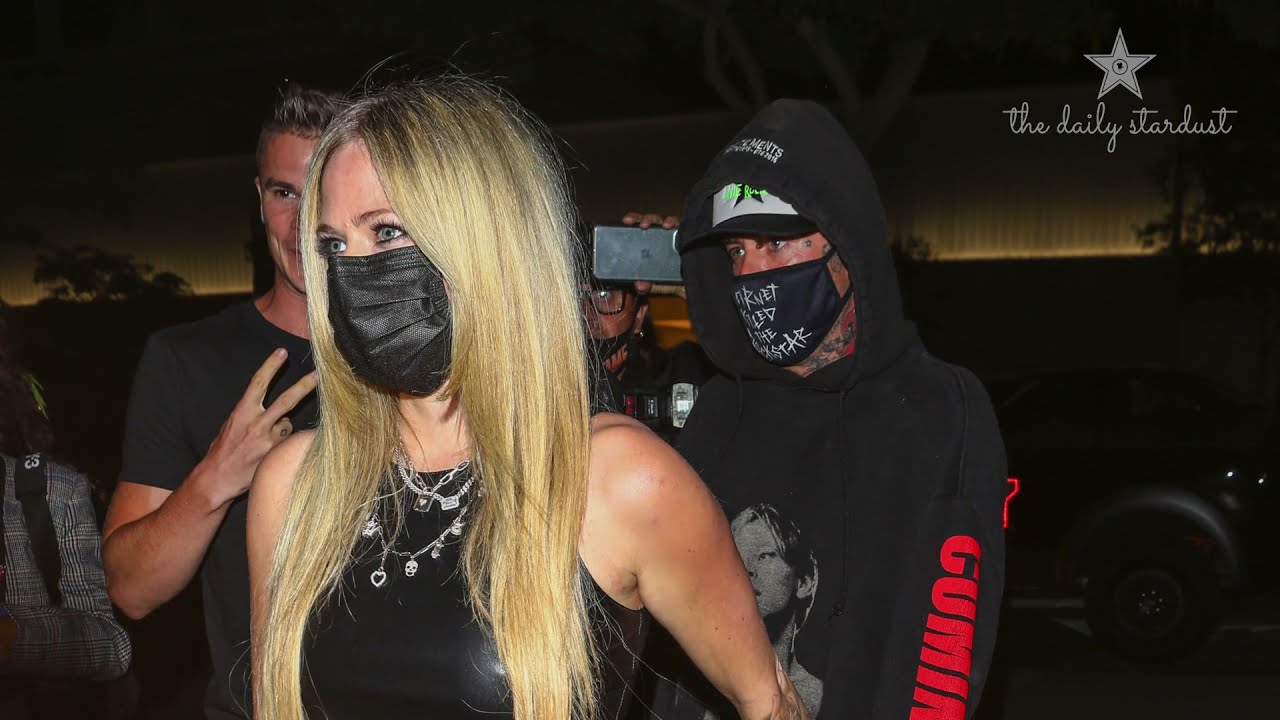 Avril Lavigne and Mod Sun look in love as they arrive to romantic dinner at BOA Steakhouse