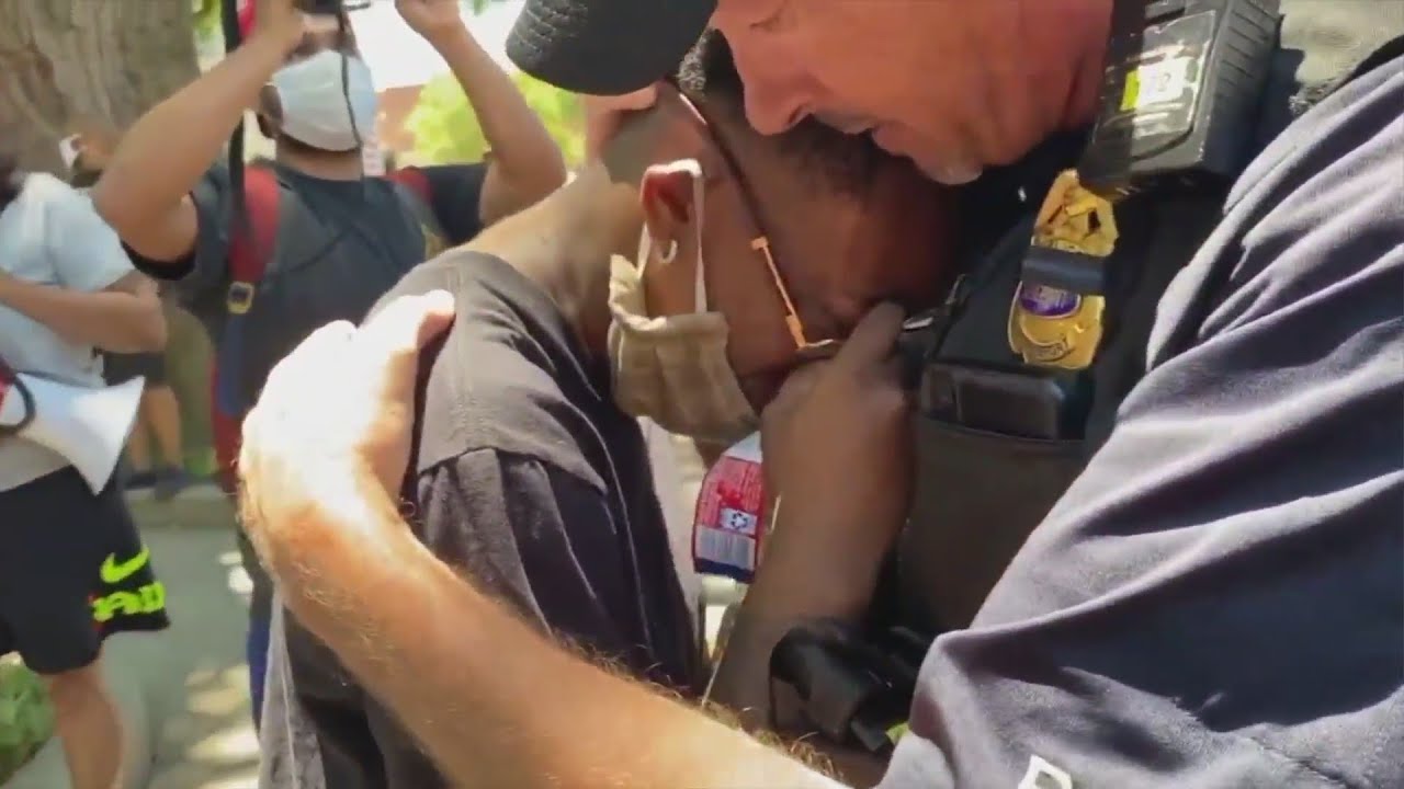 Moments of shared humanity bring people together amidst unrest across the U.S.