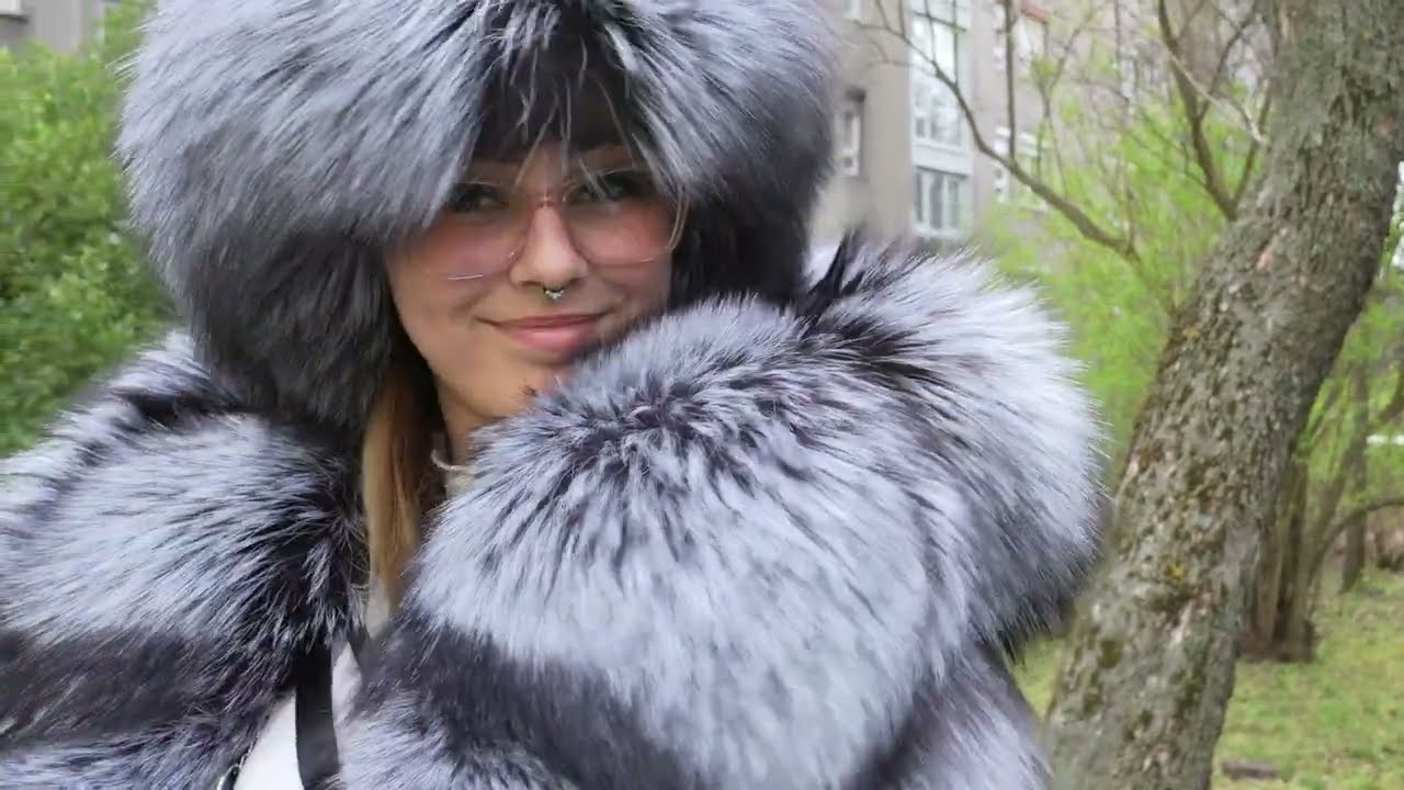 FurWalk in silver fox fur coat and fox fur hat