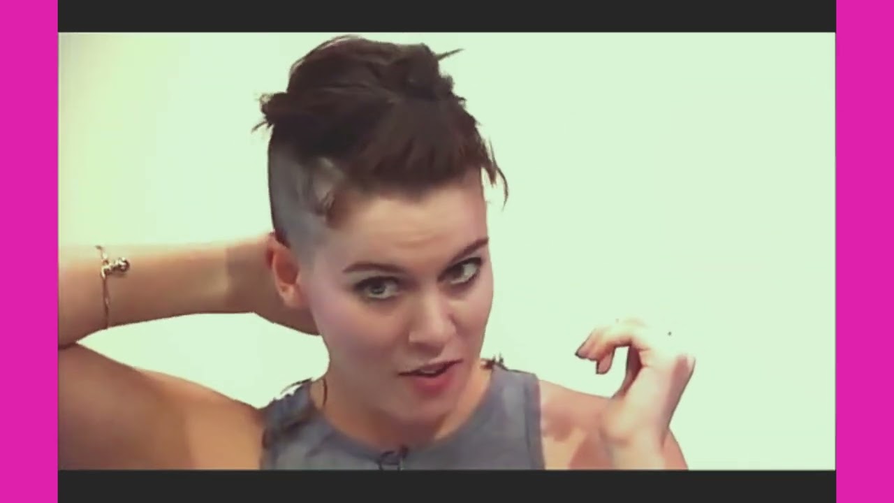 Gorgeous girl in TV shows the moderators how to shave a head properly