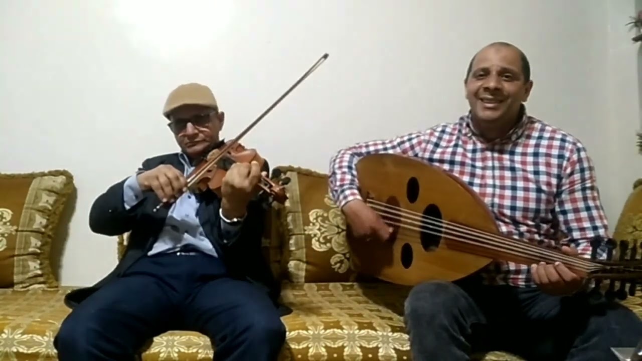 على حسب وداد بصوتي المتواضع وعازف آلة الكمان استاذ محمد الحلوي