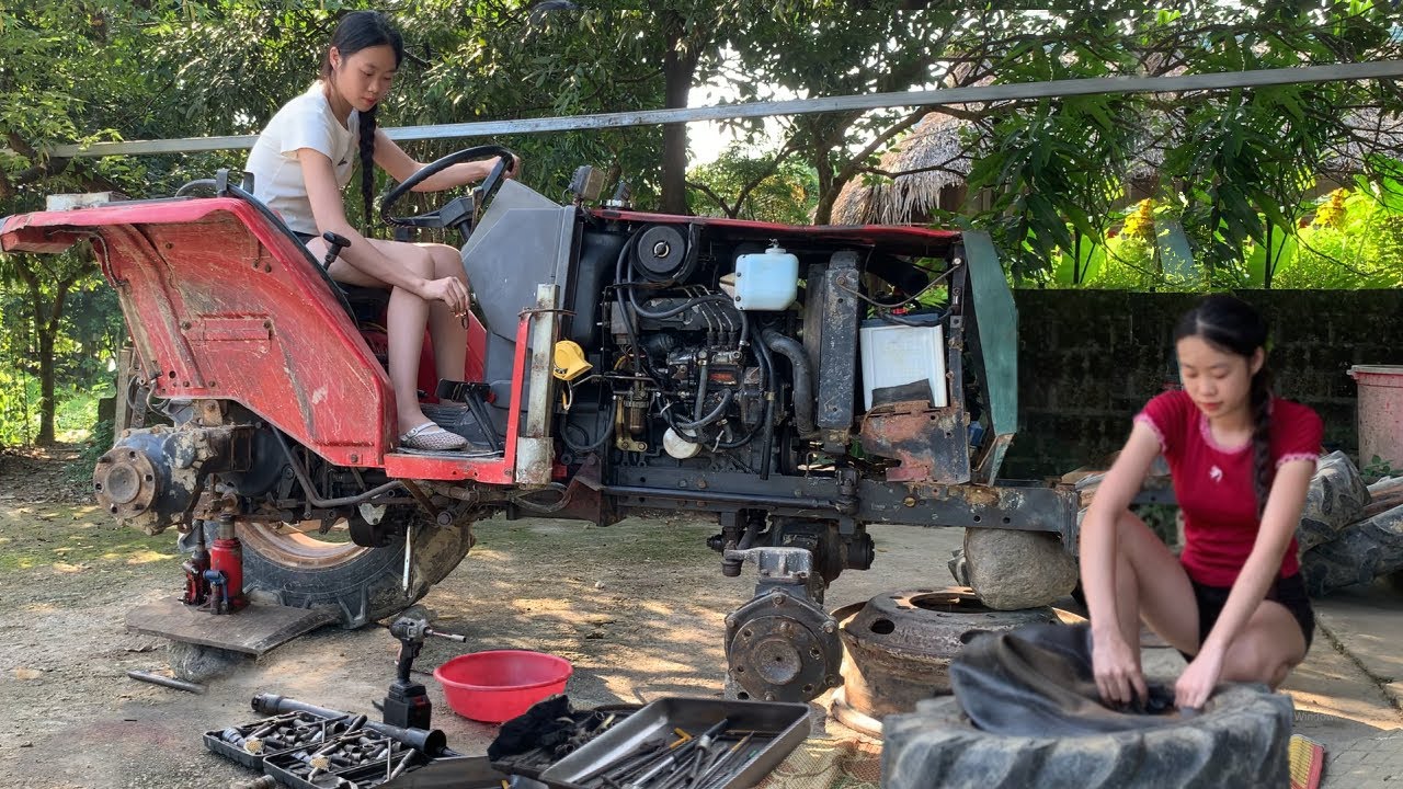 Girl fixes broken kubota tractor for man.