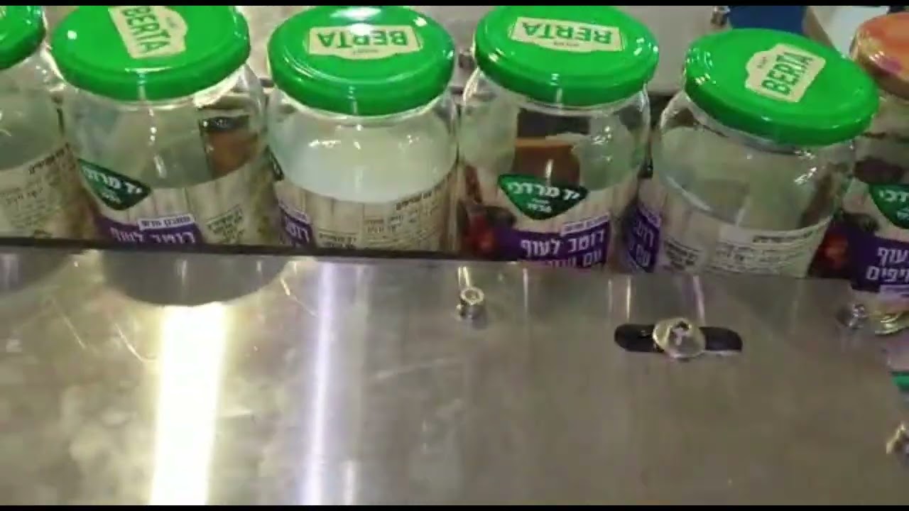 Labeling Machine for Round Jar with Side and Top Applicators by TADBIK