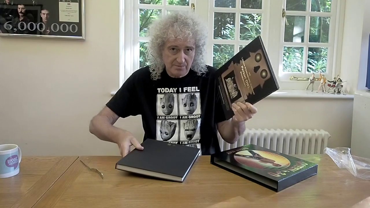 Brian May unwrapping first ever copy German Edition Queen in 3-D