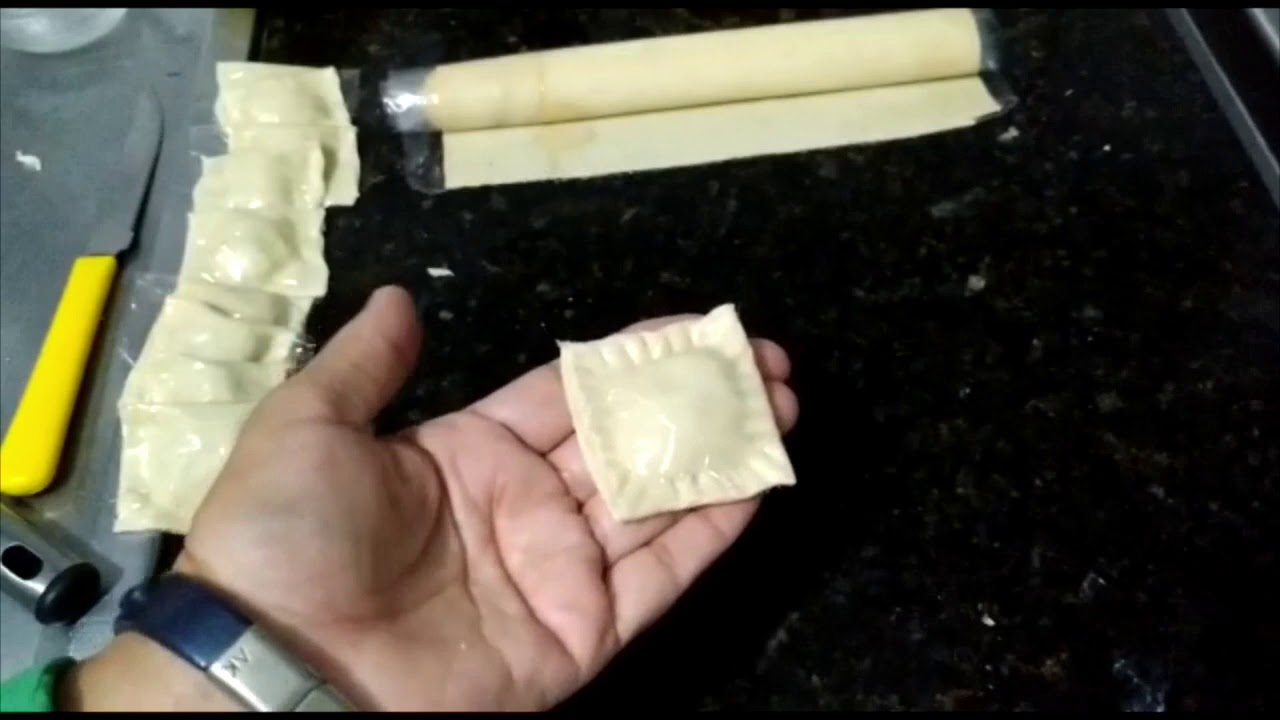 Ravioli caseiro dois sabores, frango e carne com massa de pastel!