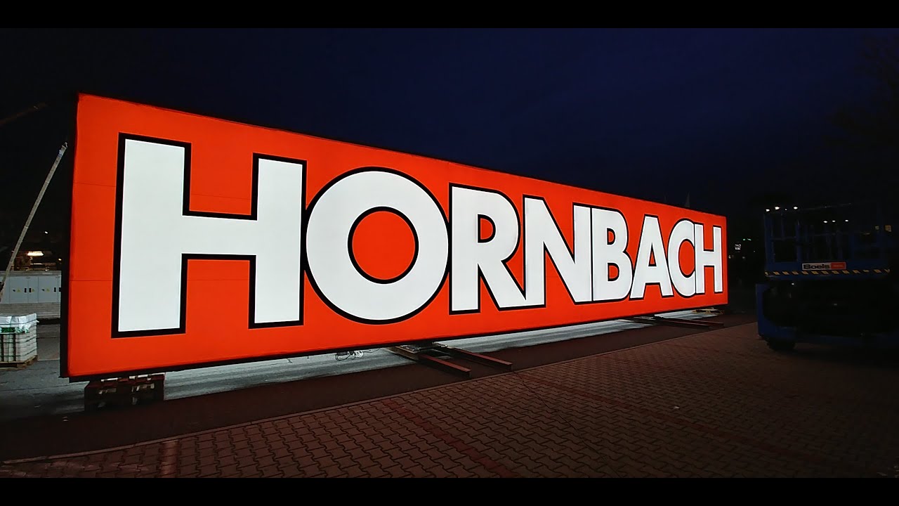 HORNBACH, repase oboustranného panelu na pylonu, Praha - Černý Most