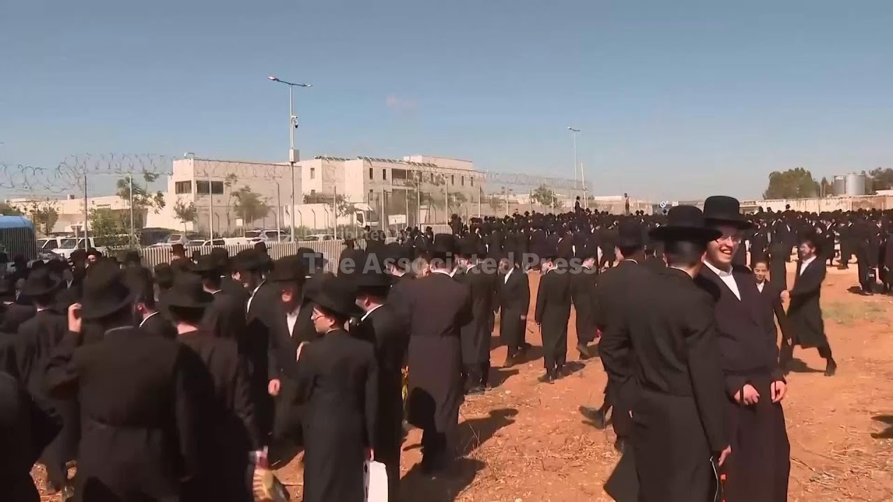 Ultra-Orthodox Jews protest outside Israeli military prison against mandatory enlistment