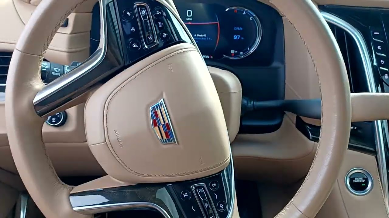 how to use the park assist feature in a 2019 Cadillac Escalade