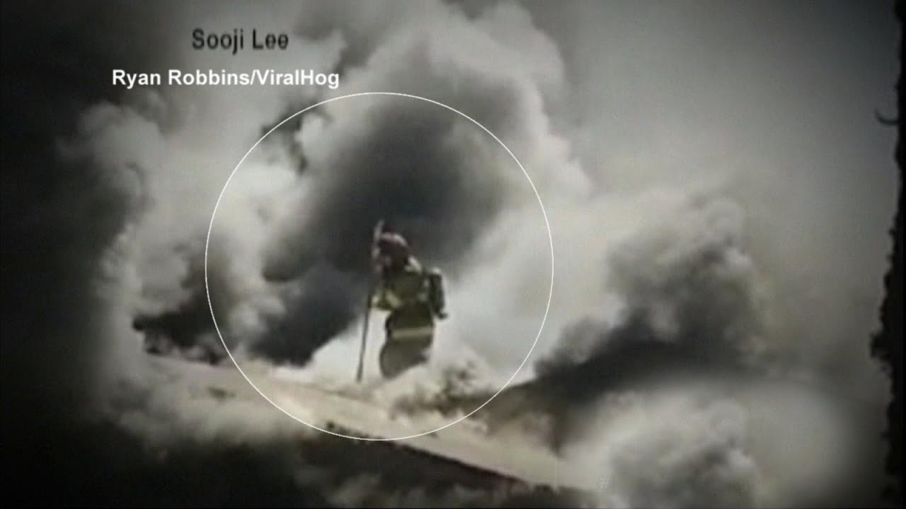 Firefighter Falls Through Burning Roof (VIDEO)