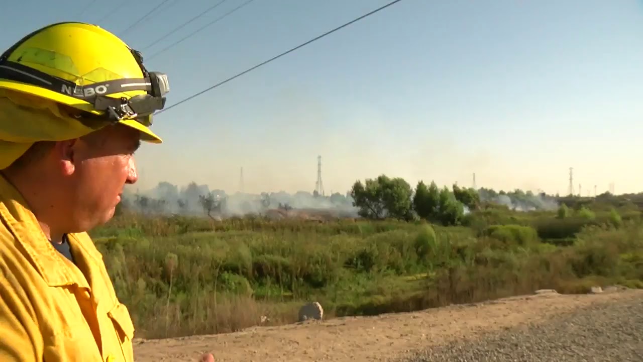 Watch Live: Small grass fire burning south of Chester Bridge in Oildale.