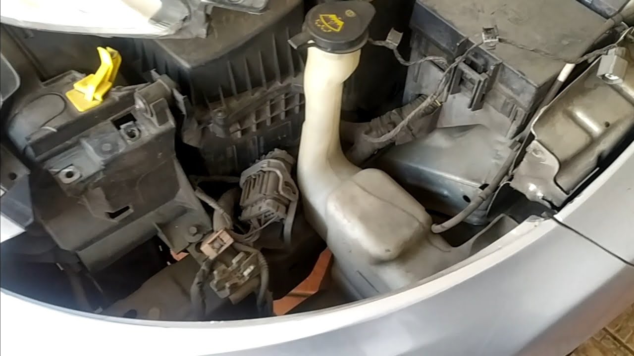 cambiar bomba de chisgueteros, Ford fiesta 2013