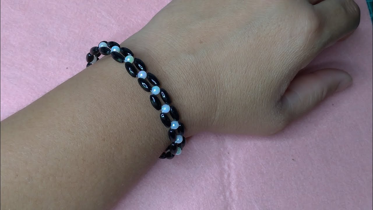 Pulseira entrelaçada com miçanga em formato de arroz 2
