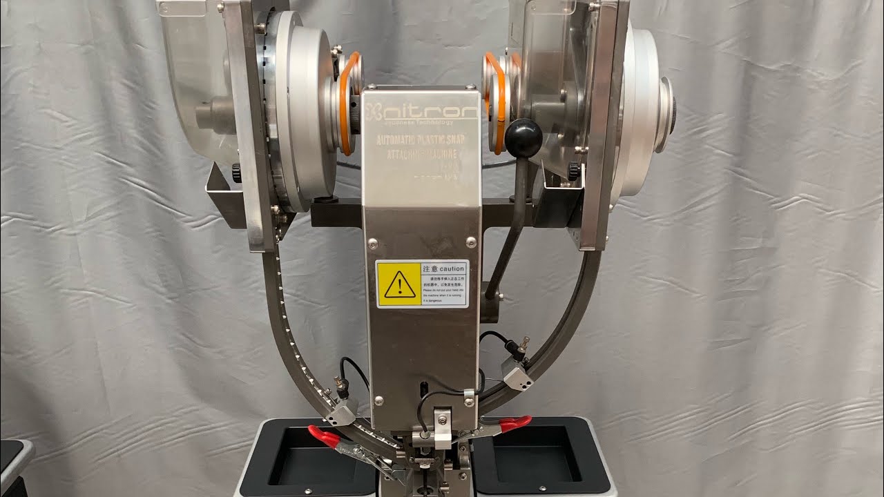 NT-90 BUTTON FASTENING MACHINE