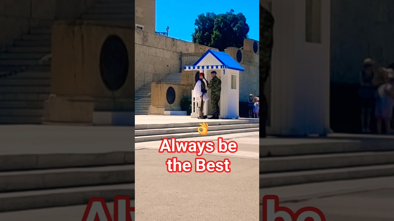 Greek Guard fixing uniform & tassel perfectly 