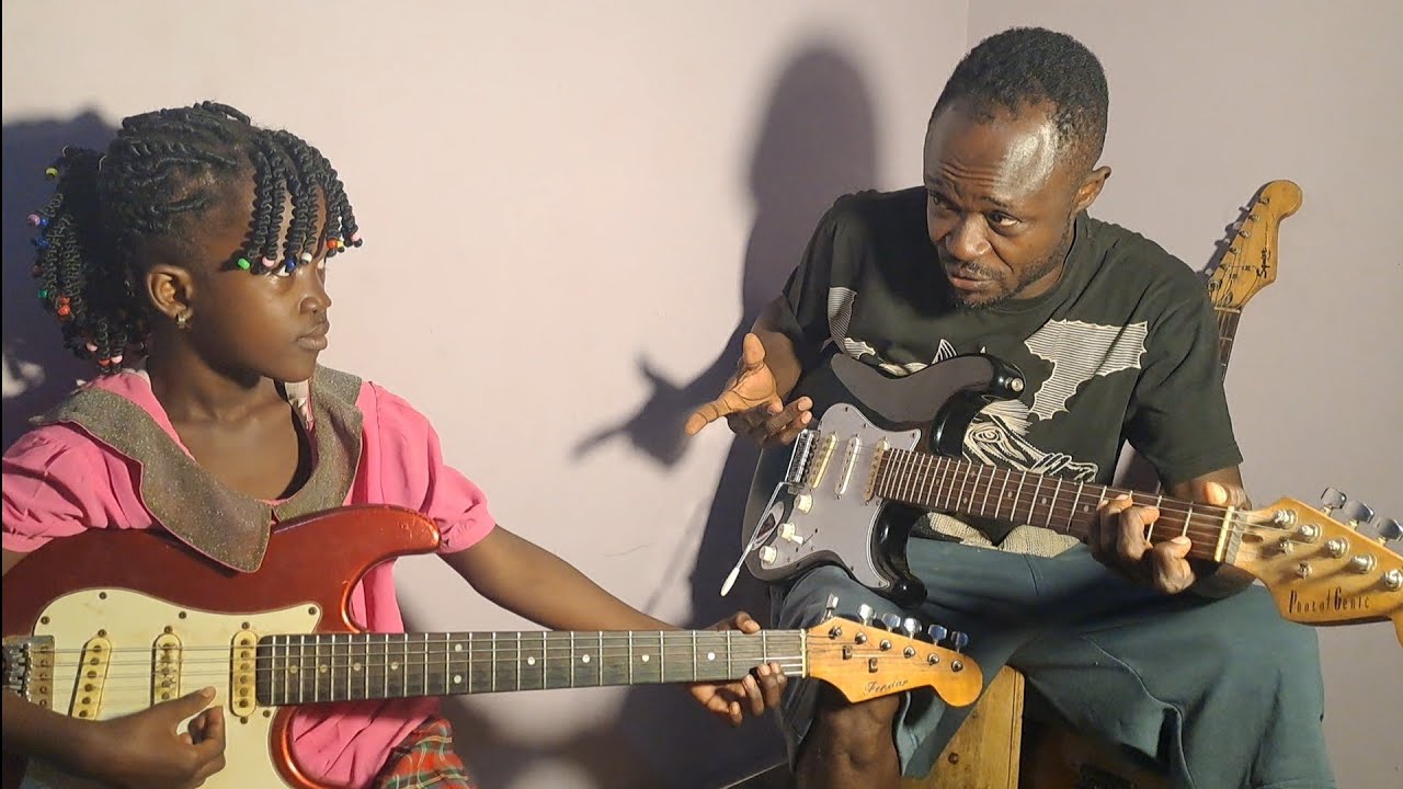 Join this 8year old girl (Christiana Kwarteng) in guitar 🎸 learning