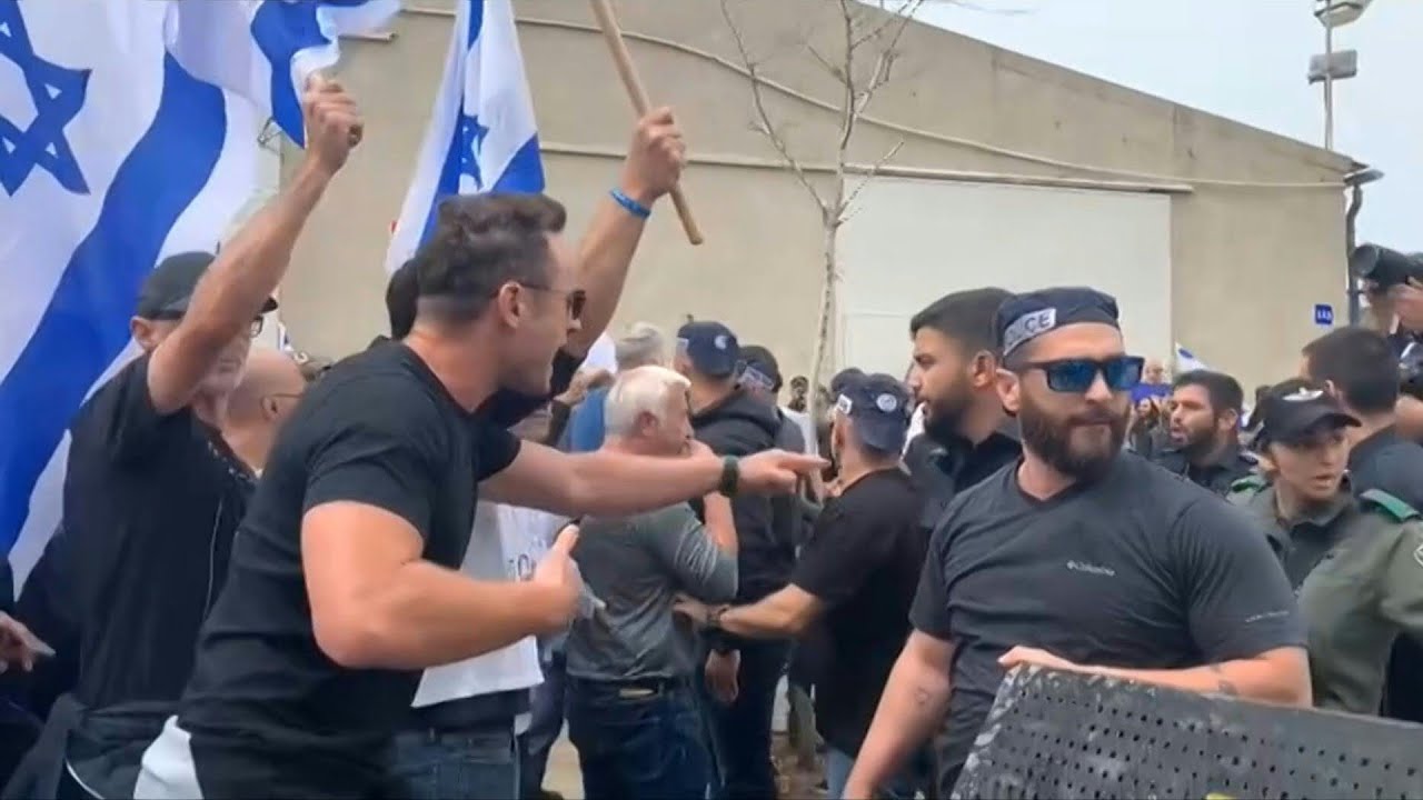 Israeli security forces scuffle with protesters during anti-govt rally | AFP