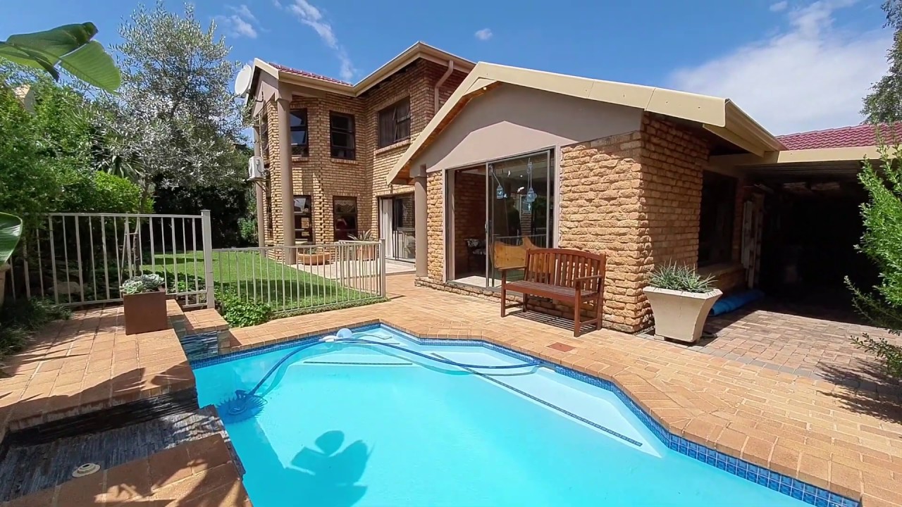 Beautiful family home for sale in the exquisite security estate in Glen Erasmia Boulevard
