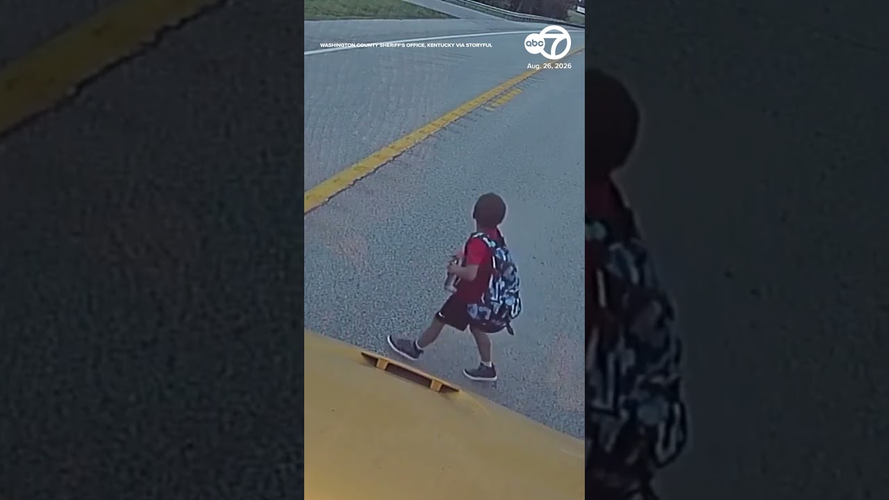 Dash Cam Captures Close Call as Driver Speeds Past Stopped School Bus