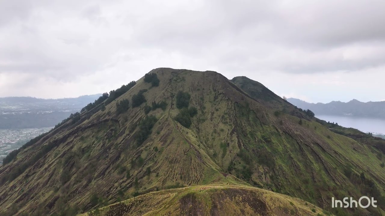 DJI Air 3S flight to an active mountain Batur volcano (Bali), with the last eruption in 1999-2000