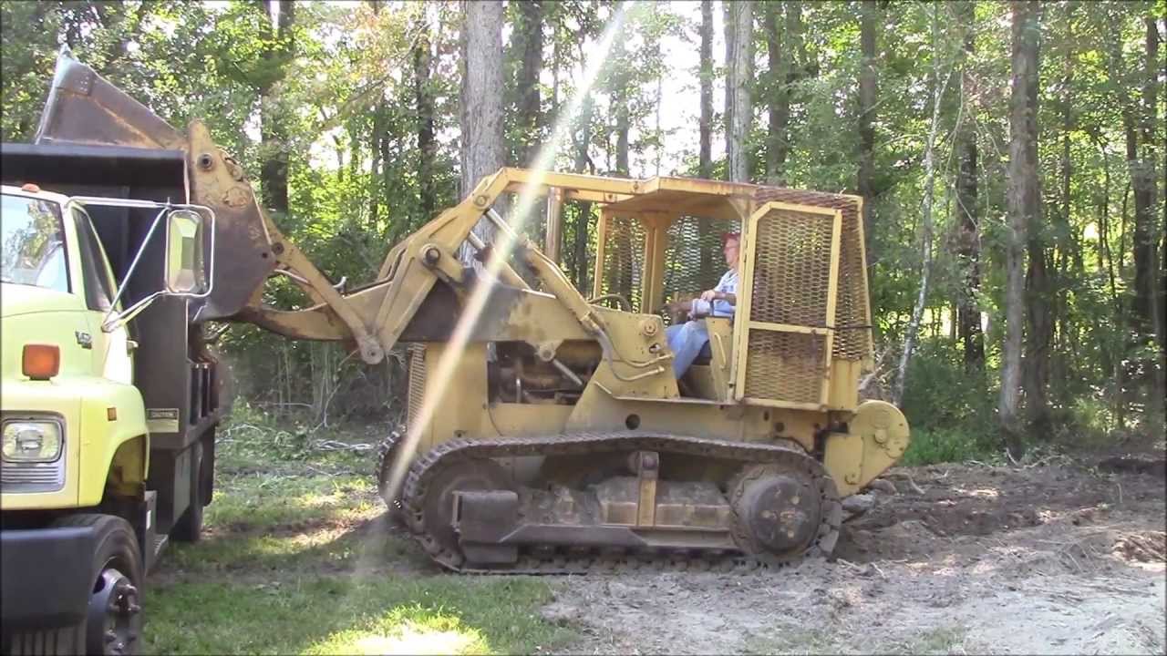 INTERNATIONAL 175B Track Loader loading stumps