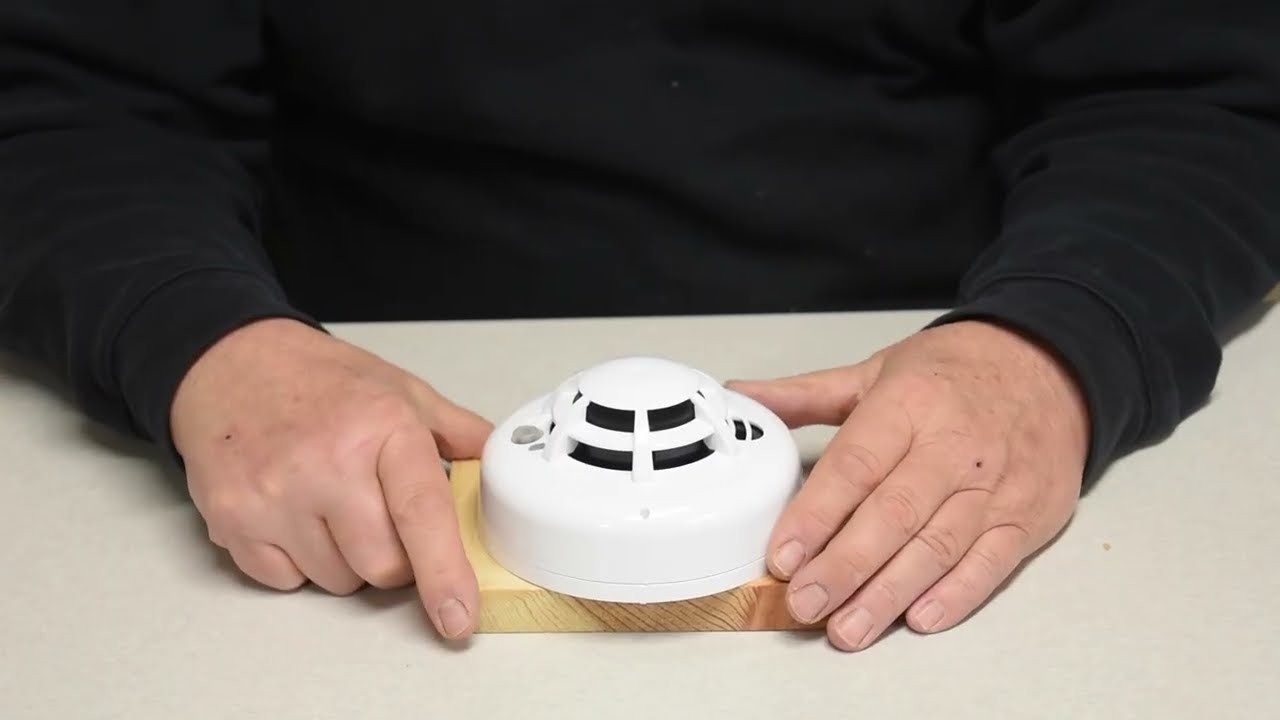 Changing the batteries in your DSC Wireless WS4936 SMOKE DETECTOR