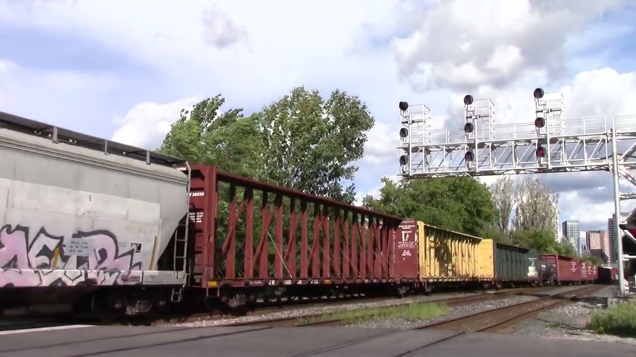 (CPKC) CP 421 with KCSM 4763 passing Osler