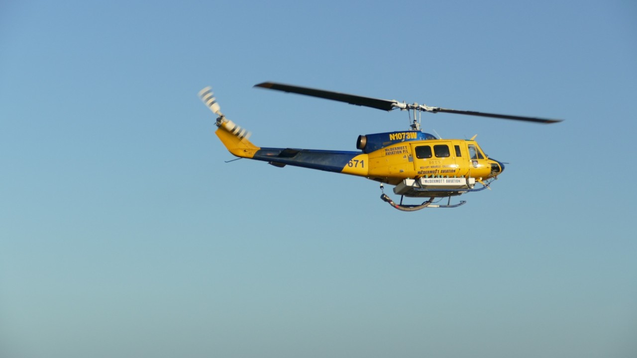 Mcdermott aviation fire helicopters taking off and landing at Busselton airport due to a fire.