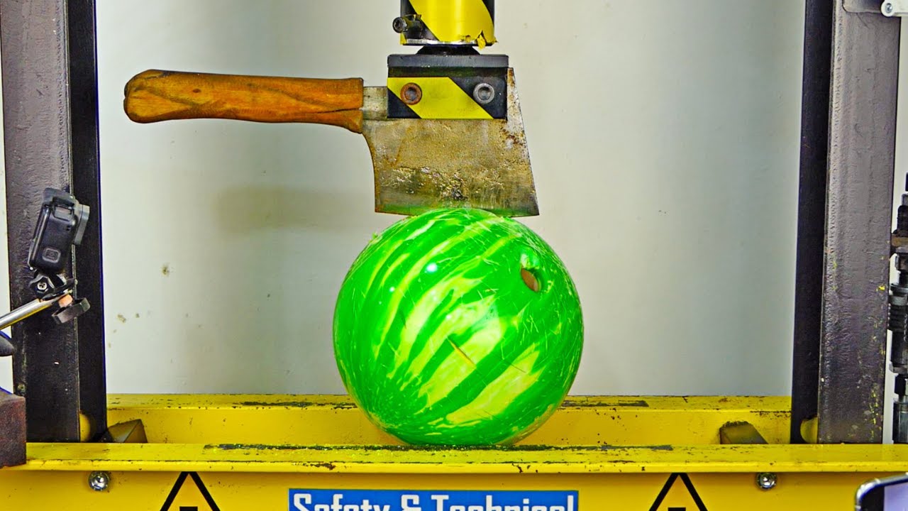 BOWLING BALL VS HYDRAULIC HATCHET