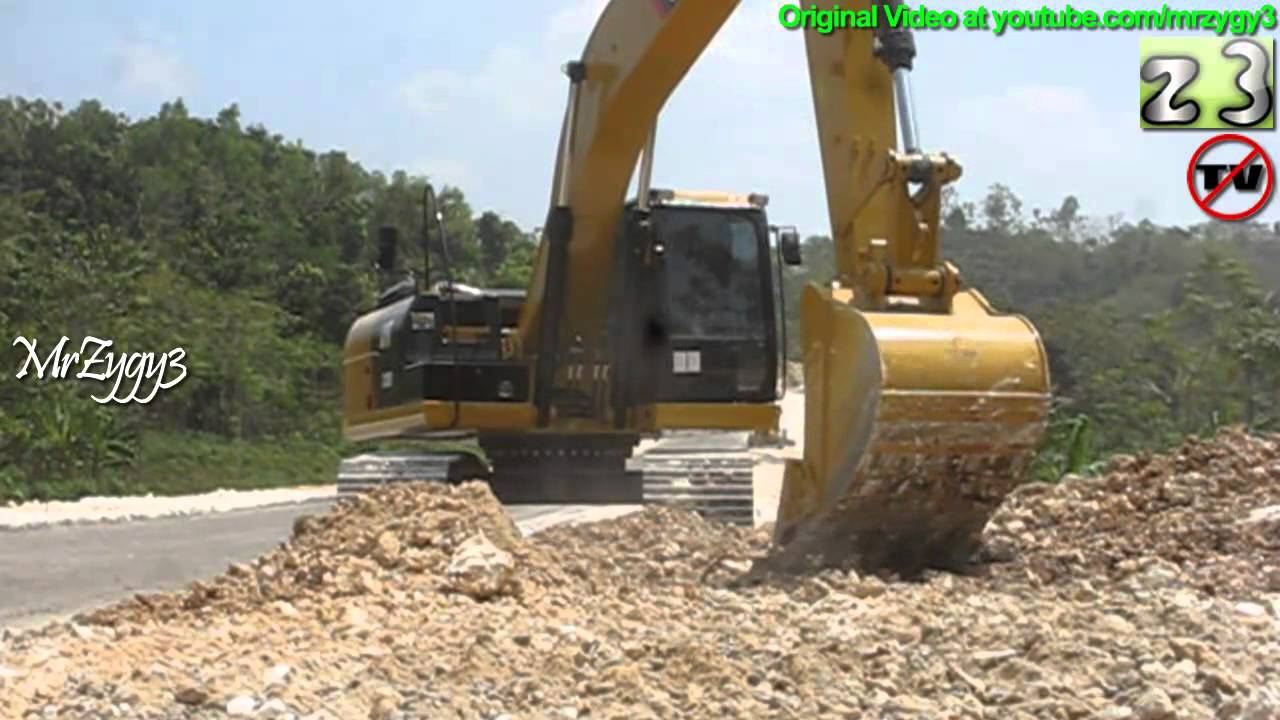 Excavator Cat 320D2 Beginning Grading Hard Lime