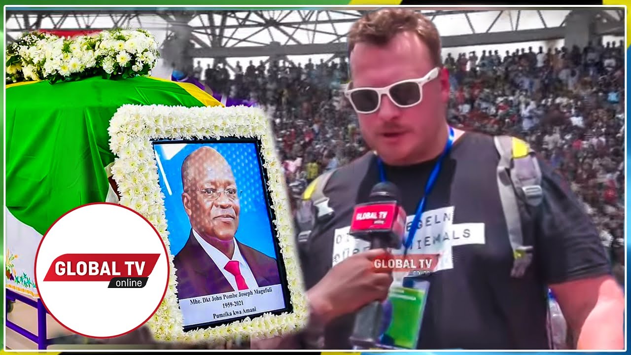MZUNGU ATINGA UWANJA WA UHURU NA MWANAE KUAGA MWILI WA RAIS MAGUFULI