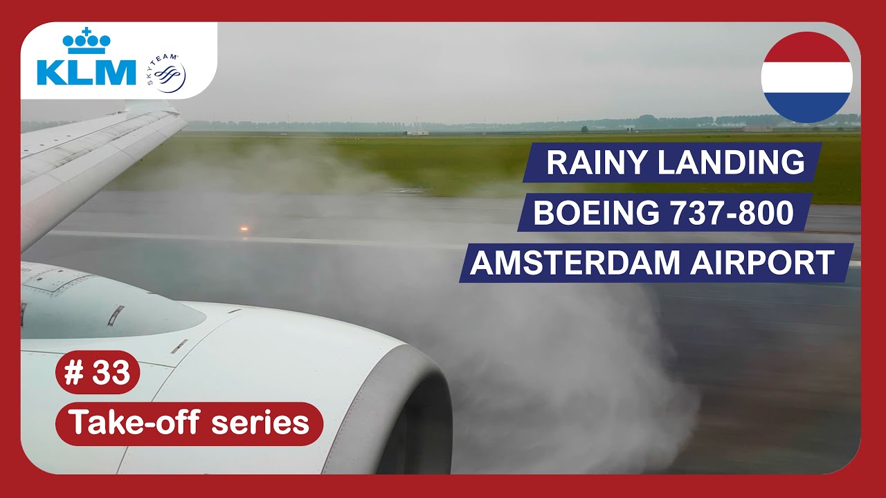 Rainy max reverse landing KLM Boeing 737-800 at Amsterdam Airport Schiphol