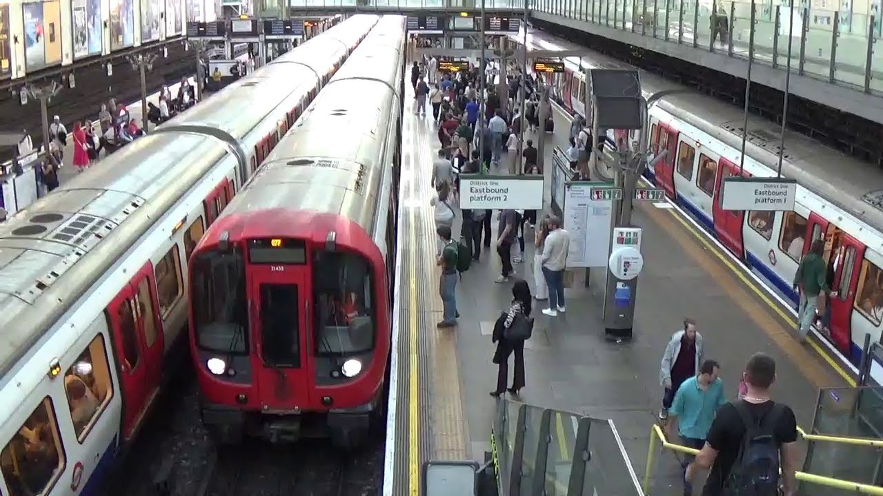 London Transport Underground 2025-District & Piccadilly Line Trains at Fulham Broadway & Earls Court