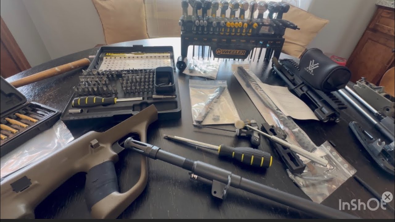 Corvus Defensio mag release, lower picatinny rail, case deflector install on the AUG
