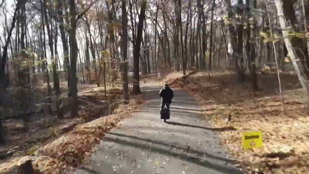 Riding my EUC on the paved trail at Johnson Park, Walker, Michigan