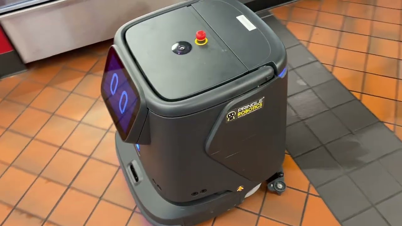 Driverless Floor Cleaner At Quality Time Gas Station.