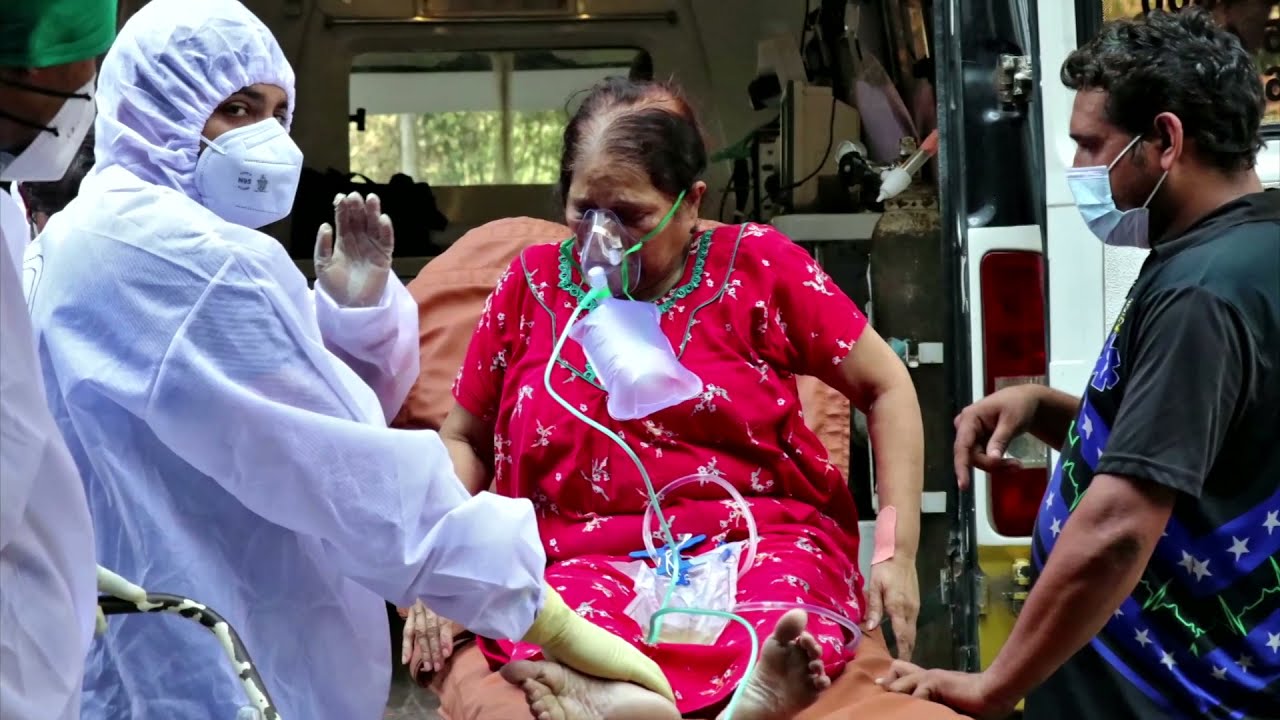 India COVID cases top 20 million, halting cricket, prompting lockdown call