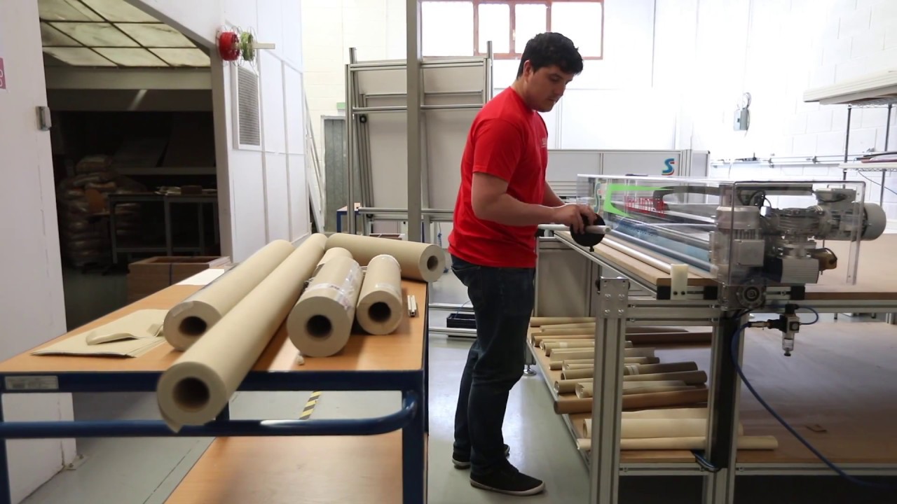 PROCESO CONTINUO DE FABRICACIÓN DE LIENZOS CON TELA EN BLANCO
