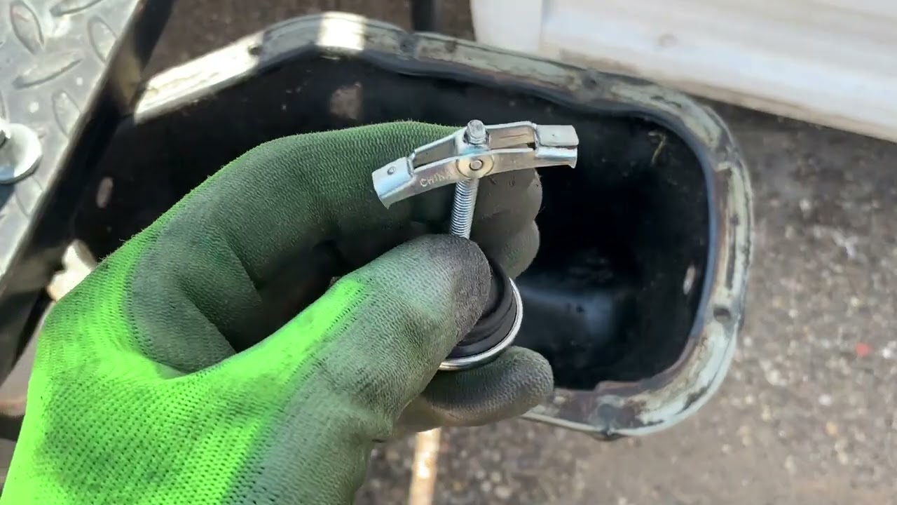 how to remove universal wingnut oil drain plug (for stripped oil pan treads)