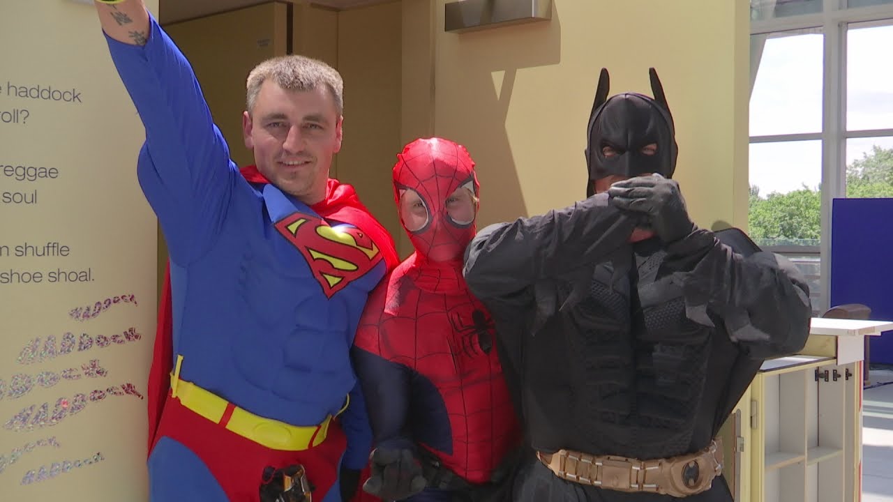 Superhero window cleaners surprise children in hospital