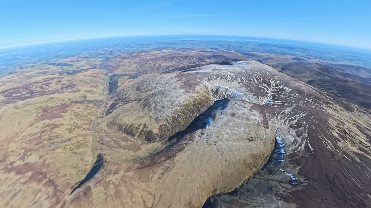 Flying from Northumberland to Scotland in a flexwing microlight.