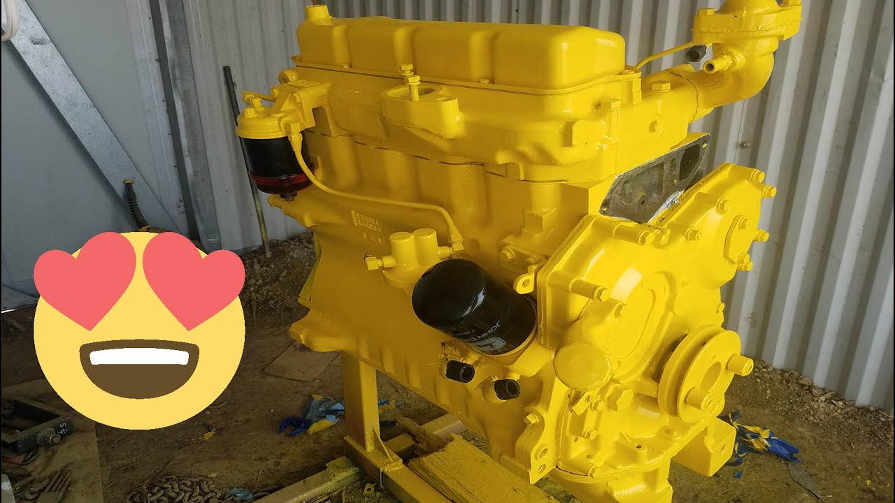 INSTALLING THE HEAD AND PAINT!!! JOHN DEERE 410 BACKHOE ENGINE REBUILT PART 3!
