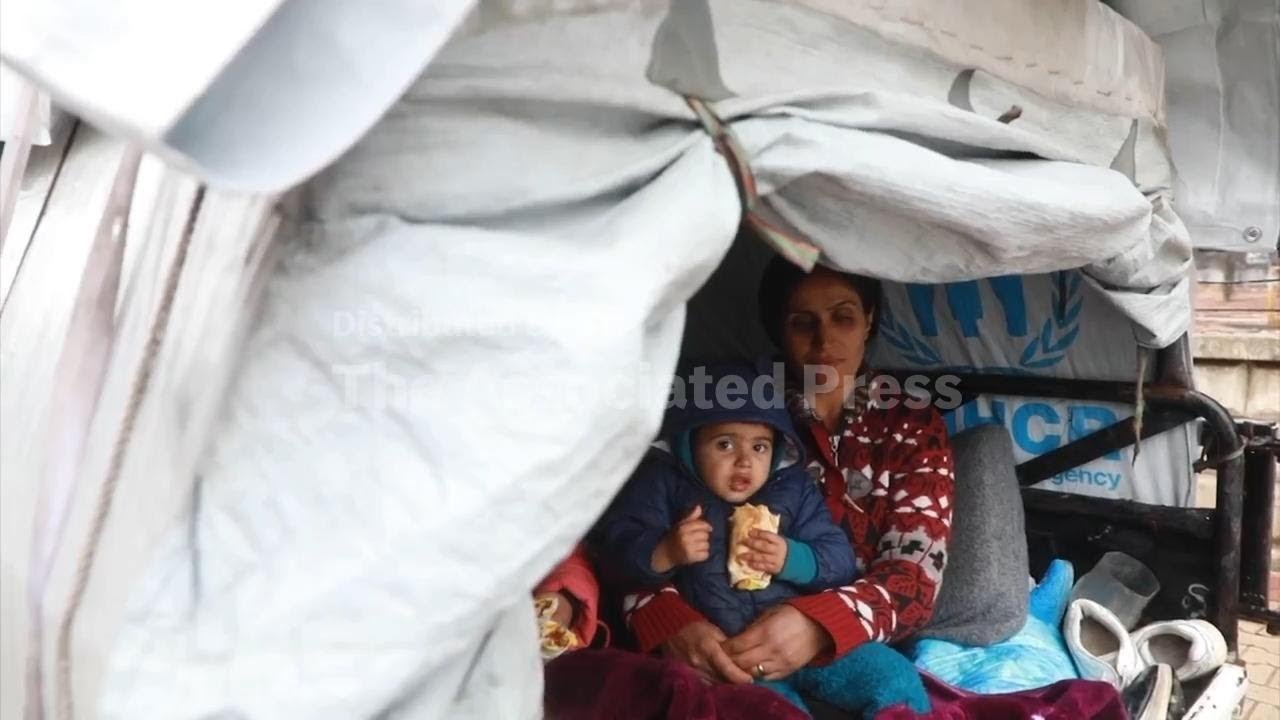 Syrian Kurds displaced again by fighting reach Qamishli ahead of ceasefire announcement