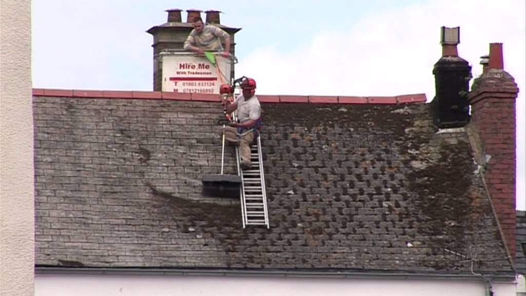 Stihl Kombi with KM-KB Brush Attachment, moss clearance from a roof in Dartmouth UK