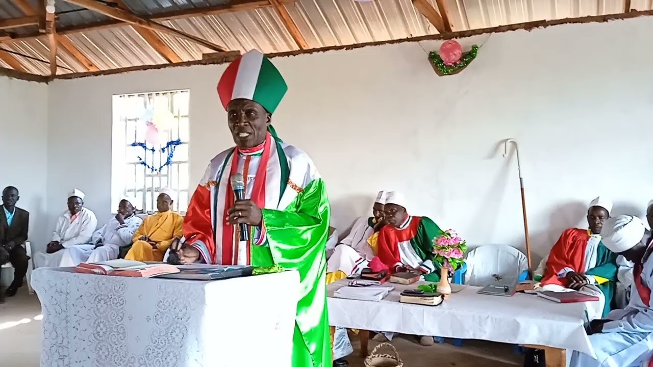 Arch Bishop Ezekiel Enane Ondeko preaching at Lugari church ceremonious opening.