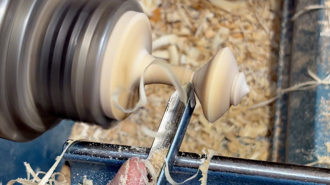 Richard Raffan turning green branches into spinning tops.