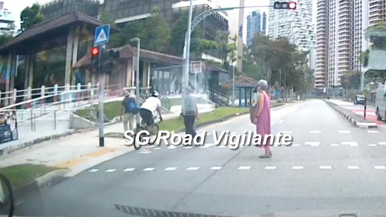25jun2026 bishan cyclists failing to conform to red light signal cut thru pedestrians