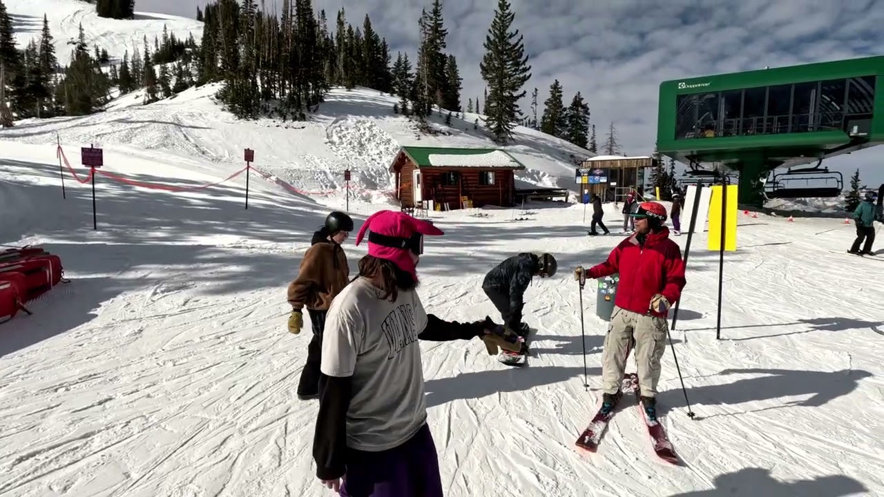 Rad high-fives a homie Brighton Ski Resort