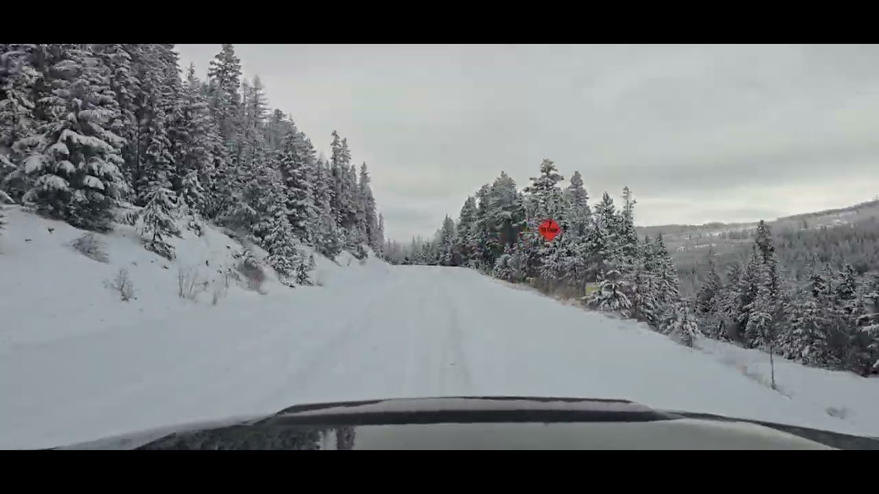 Come on a trip with me down a snowy mountain road! 