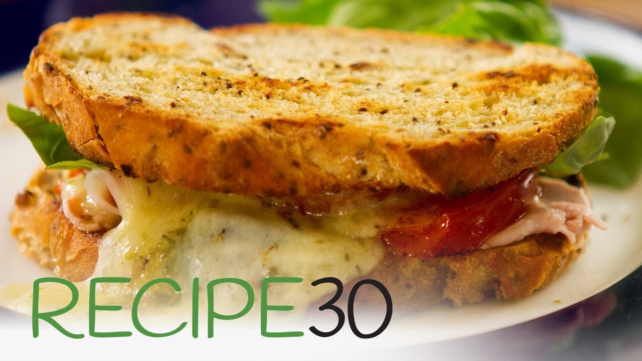 The Best Toasted Cheese and Ham Sandwich, Italian style with tomato and basil